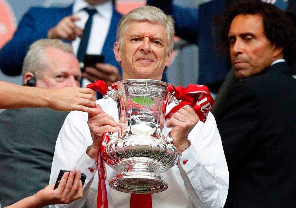 Arsene Wenger with the FA Cup as Arsenal manager.