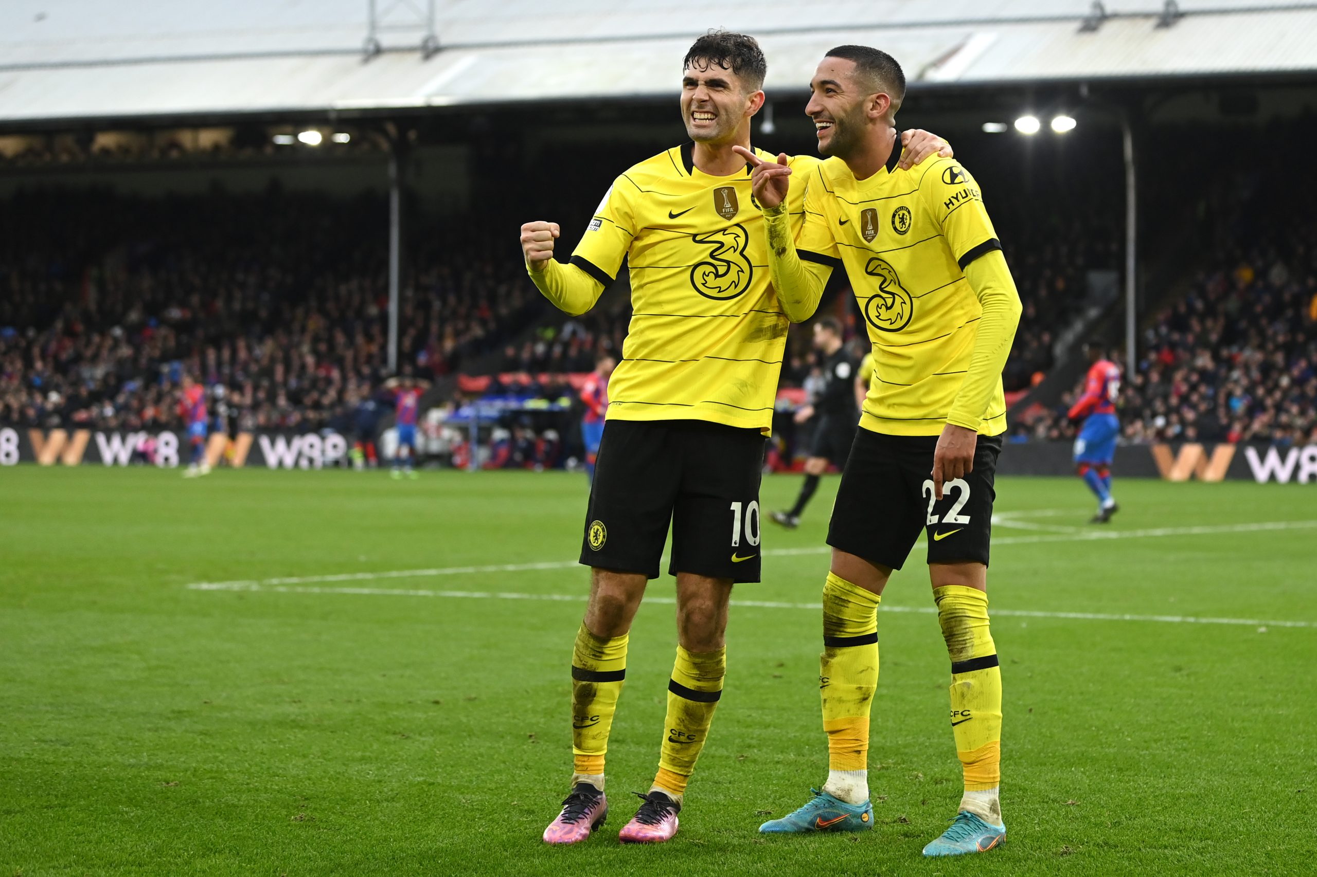 Hakim Ziyech celebrates with Christian Pulisic of Chelsea.