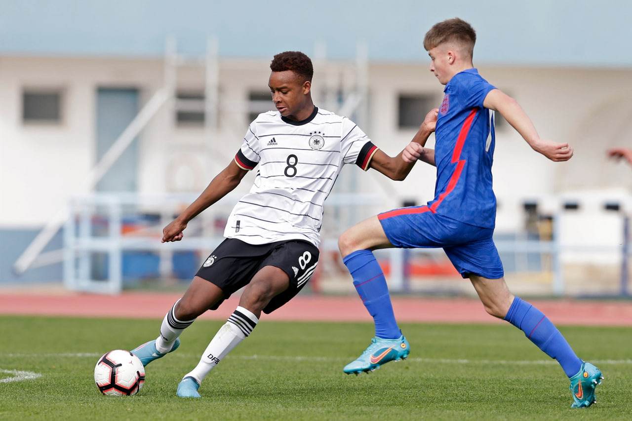 Jimmy-Jay Morgan (R) of u16 England challenges Assan Oedraogo (L) of u16 Germany.