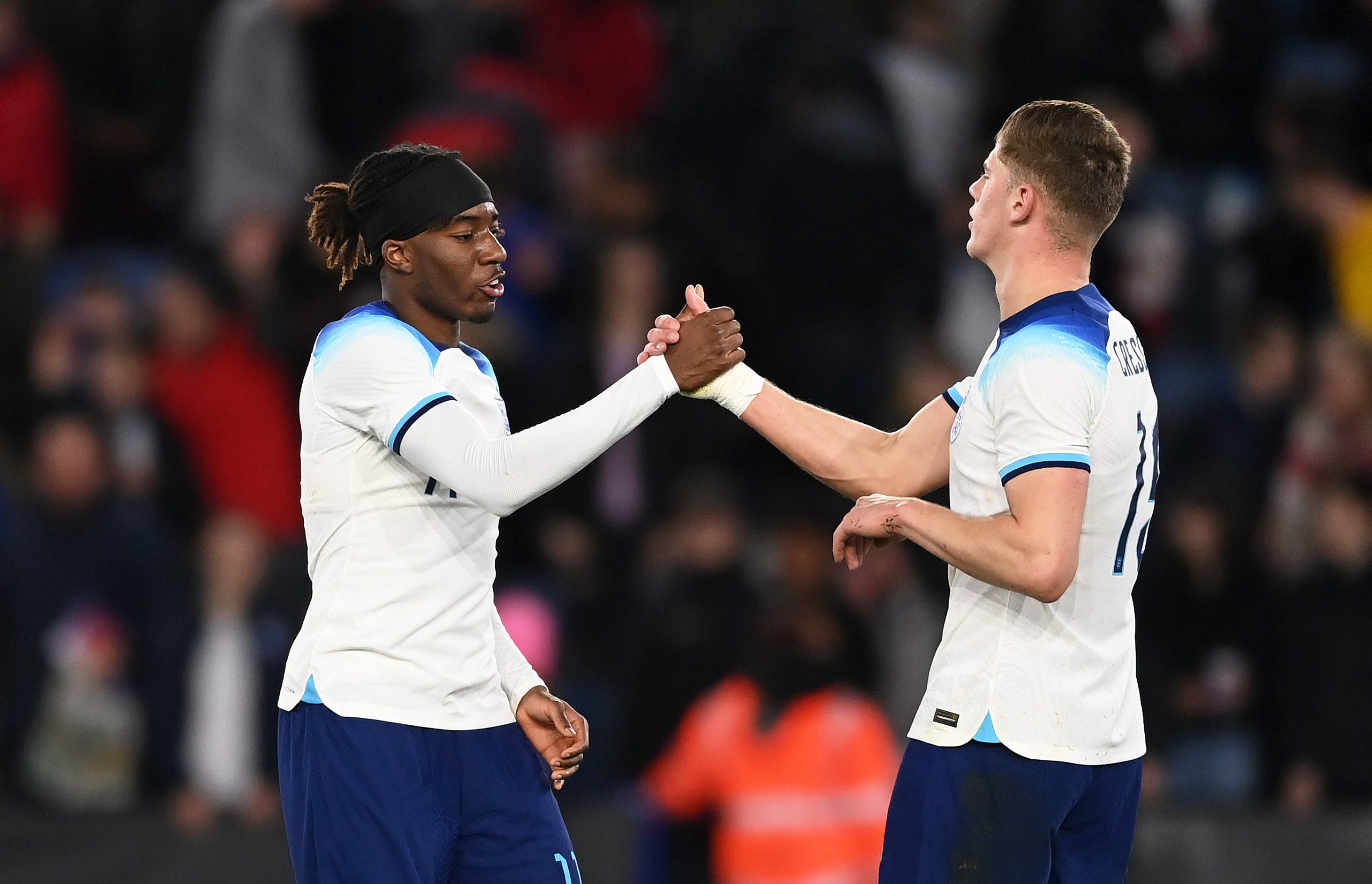 Charlie Creswell and Noni Madueke of England U21 celebrate against France U21.